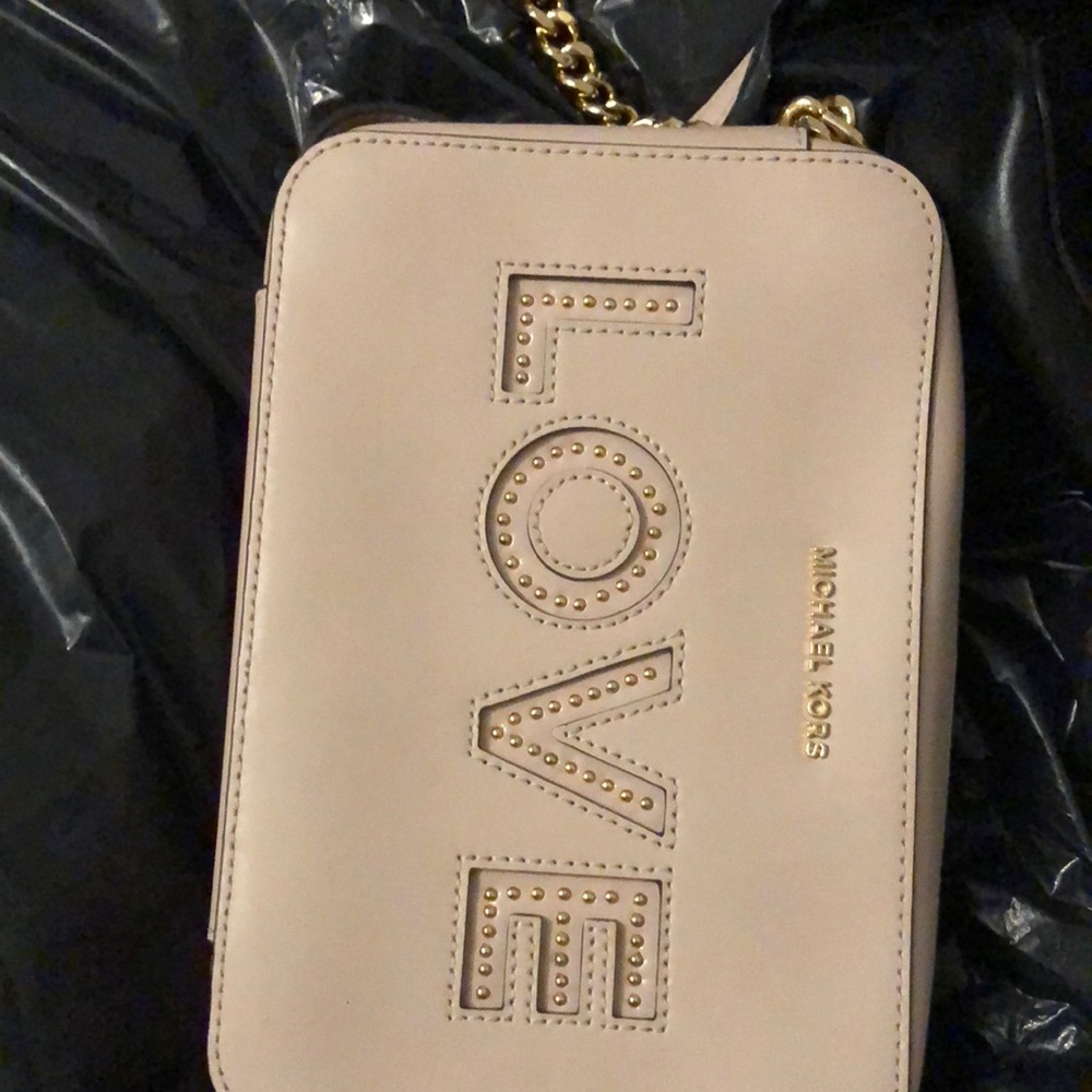 MK pink crossbody purse